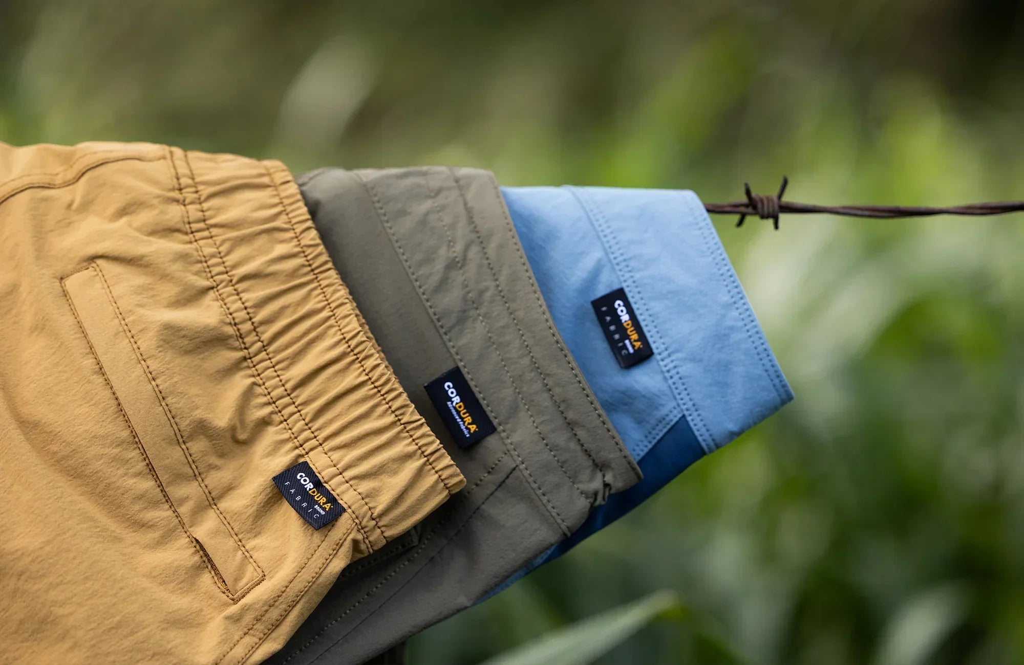 florence cordura shorts sitting on fence